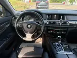 BMW 740d 2014 — фото 14