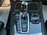 BMW 740d 2014 — фото 27